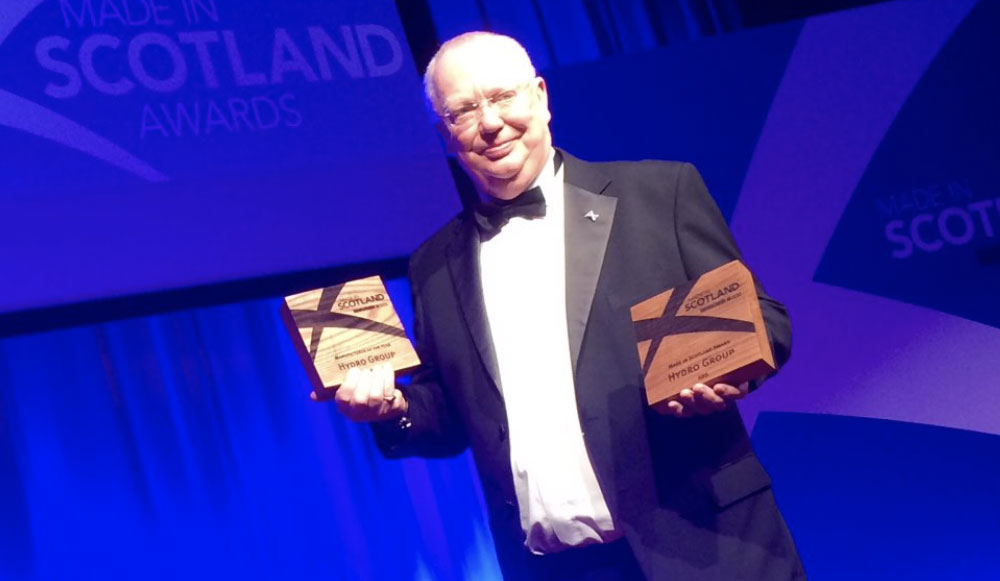 Doug Whyte with two awards