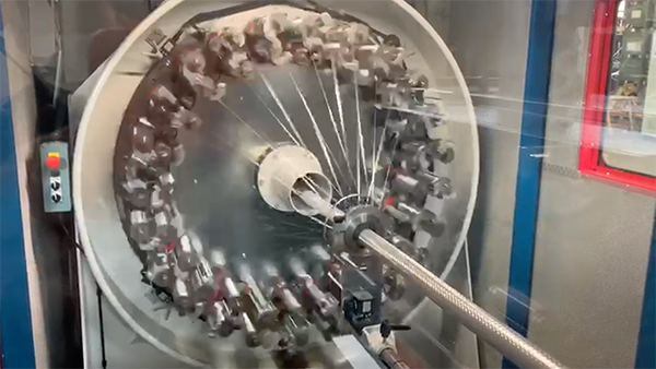cable being braided on the machine